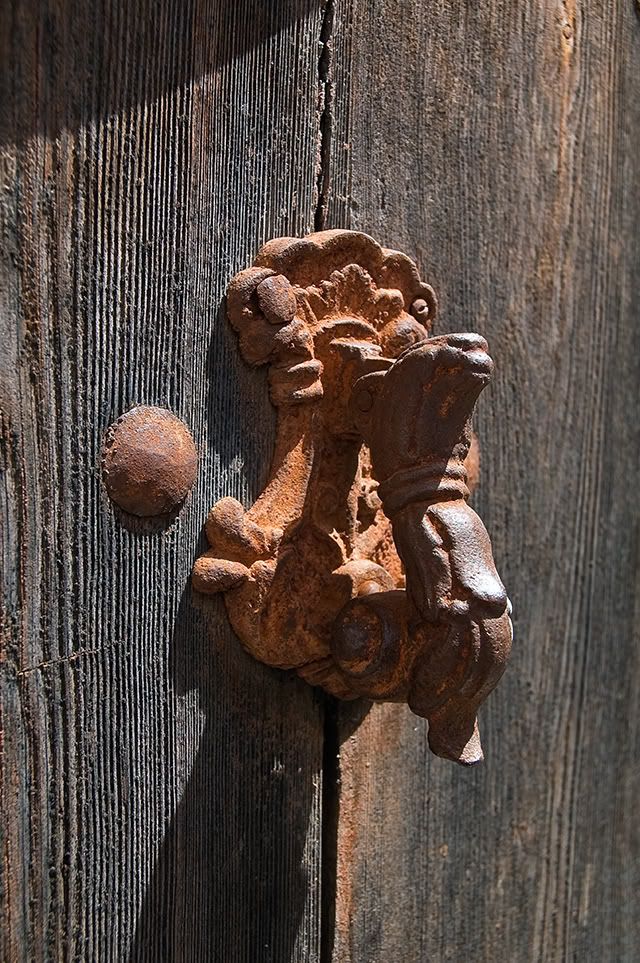 Rusty Door Knocker in Torrelles de Llobregat , Barcelona, Spain [enlarge]