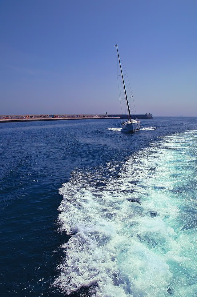 Sailboat Coming In Barcelona Port [enlarge]
