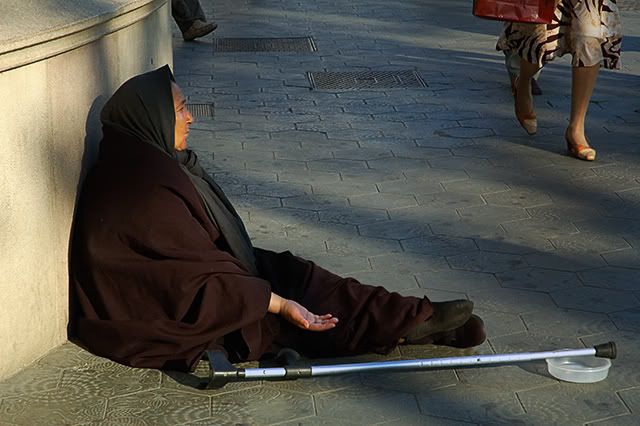 Poverty-Stricken Barcelona: Woman Begging, Paseo de Gracia [enlarge]