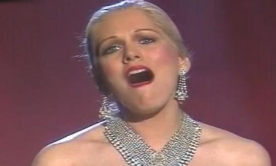 Florence Lacey as EVITA