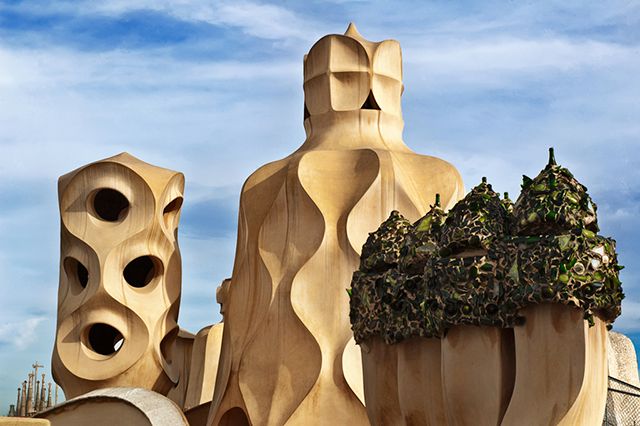 Modernist Chimneys by Antoni Gaudi on La Pedrera or Casa Mila Roof [enlarge]