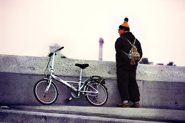 Man in Catalan Wool Knit Hat and Bike