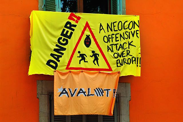 Neocon danger protest sign