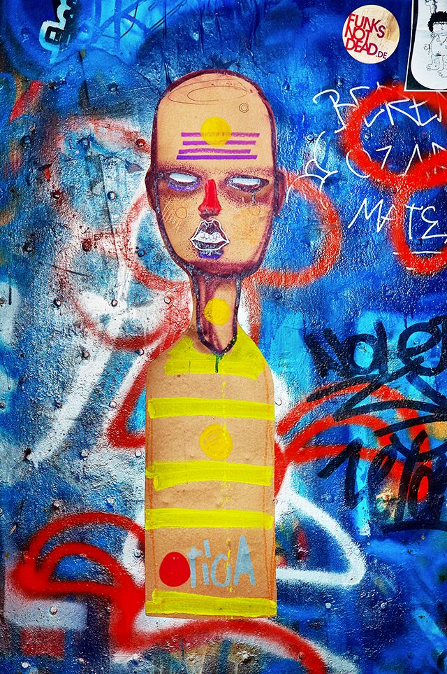 Hieratic Paper Figure on Graffiti, Barri Gotic, Barcelona
