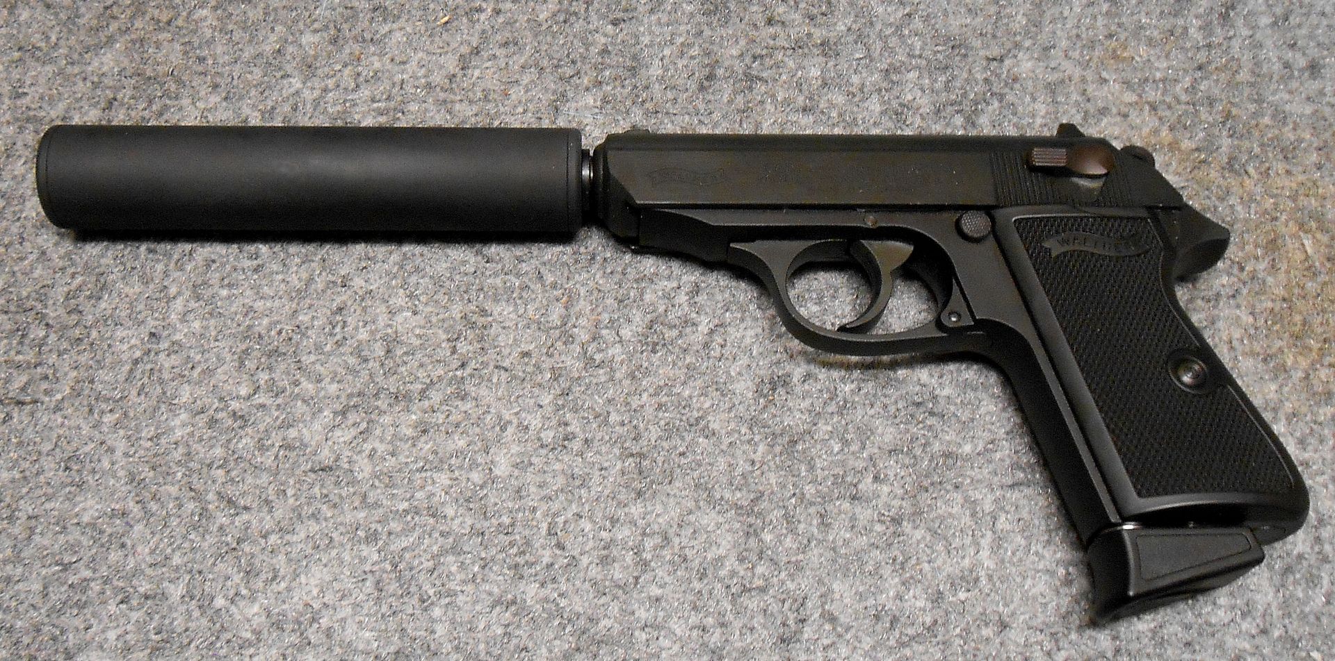 Tactical Innovations thread adapter and display (fake) suppressor. http://w...